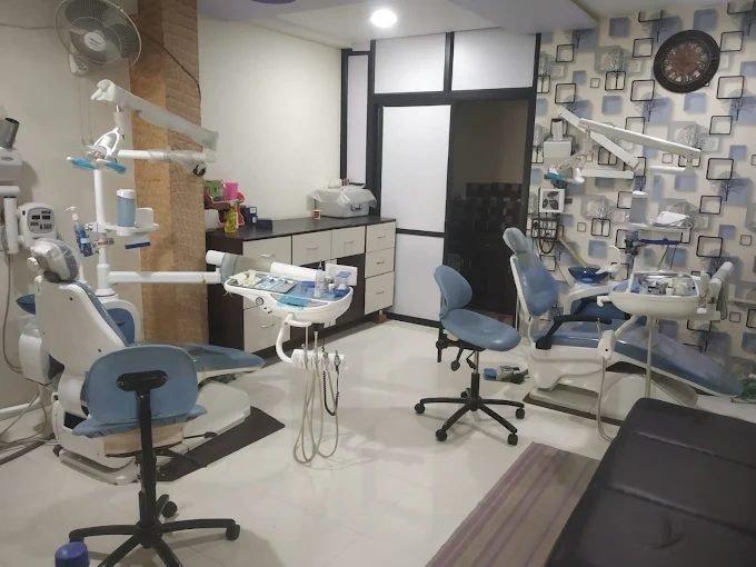 Treatment room at Ambica Dental Clinic with modern dental chairs